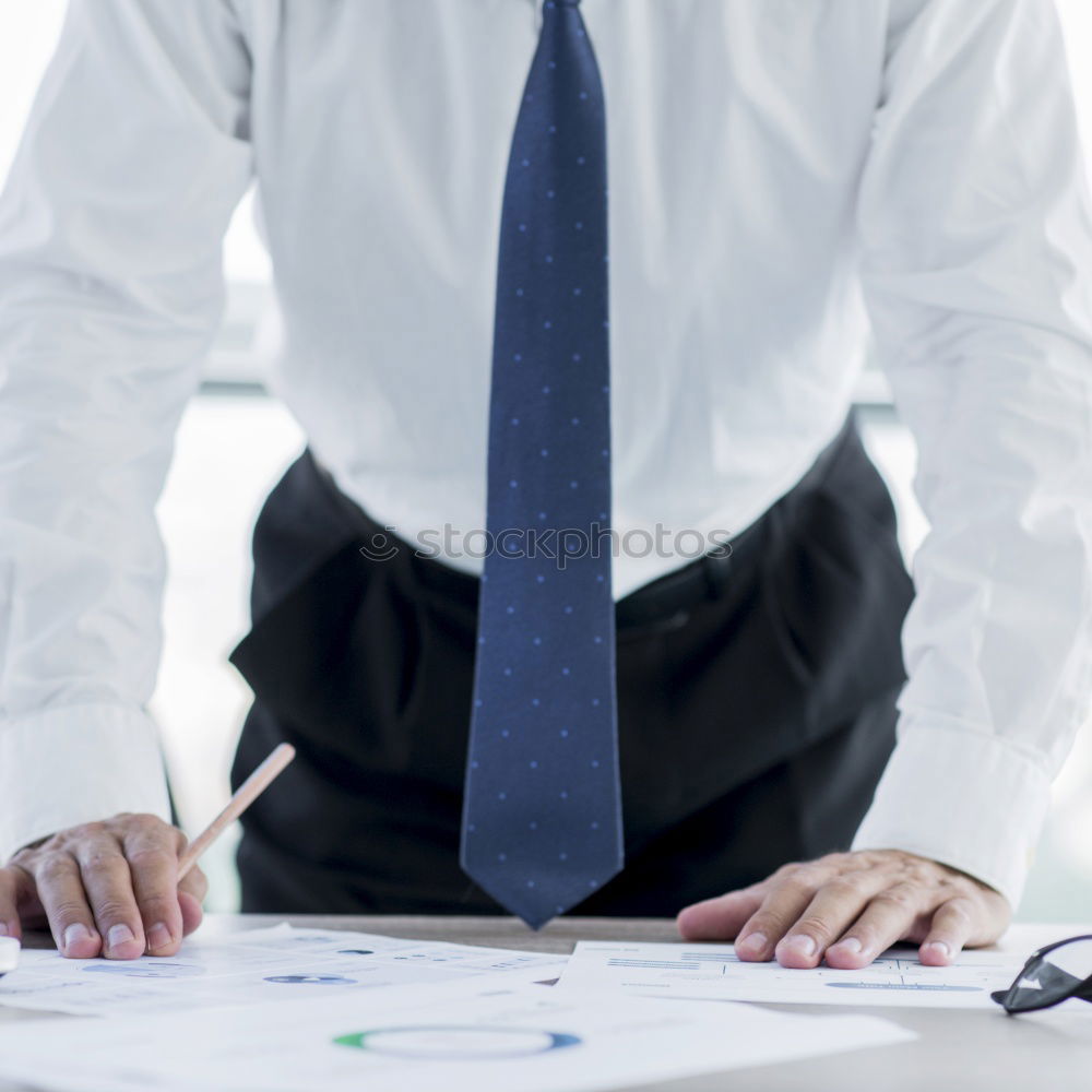 Similar – Image, Stock Photo Young architect working at home drawing plans