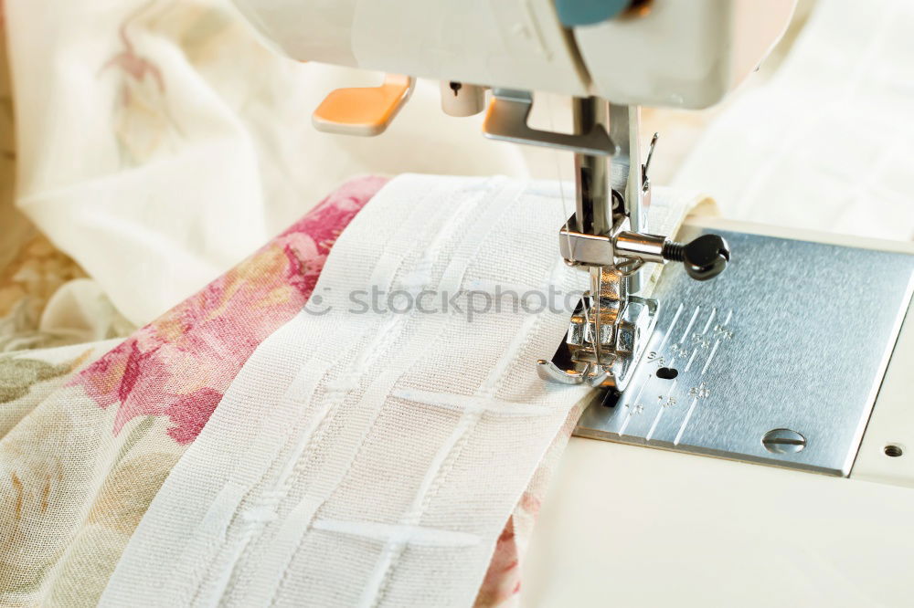 Similar – Image, Stock Photo Woman sewing on a sewing machine