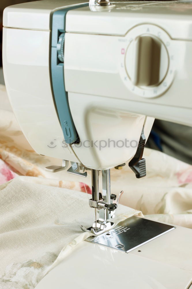 Similar – Image, Stock Photo Woman sewing on a sewing machine