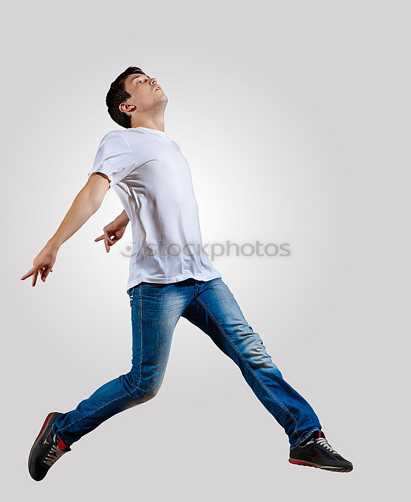 Similar – Muscular man stretching outdoors