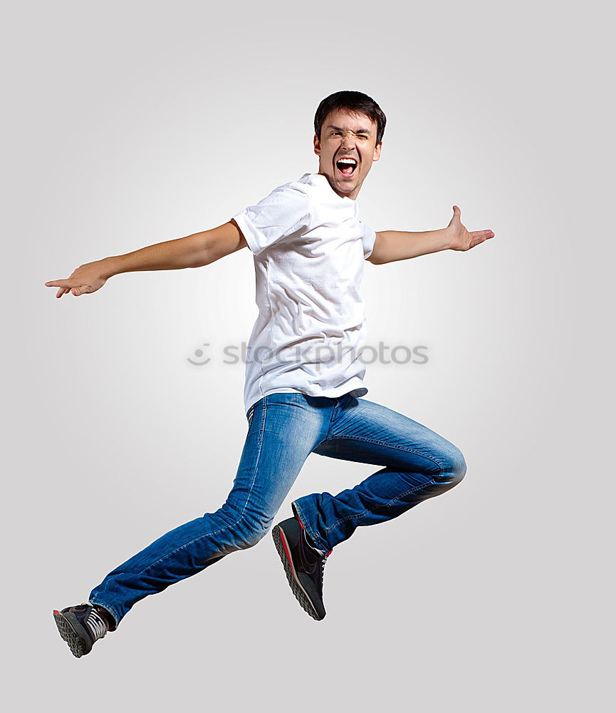 Similar – Image, Stock Photo Young man jumping in urban background