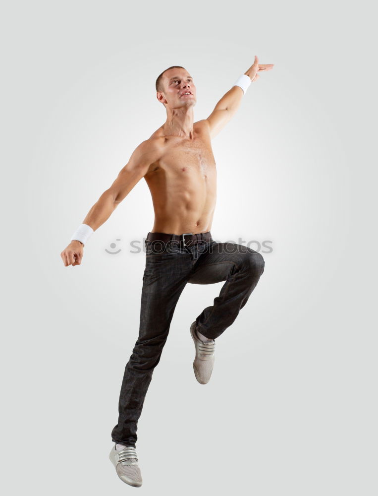 Image, Stock Photo Young black man wearing casual clothes jumping in urban background.