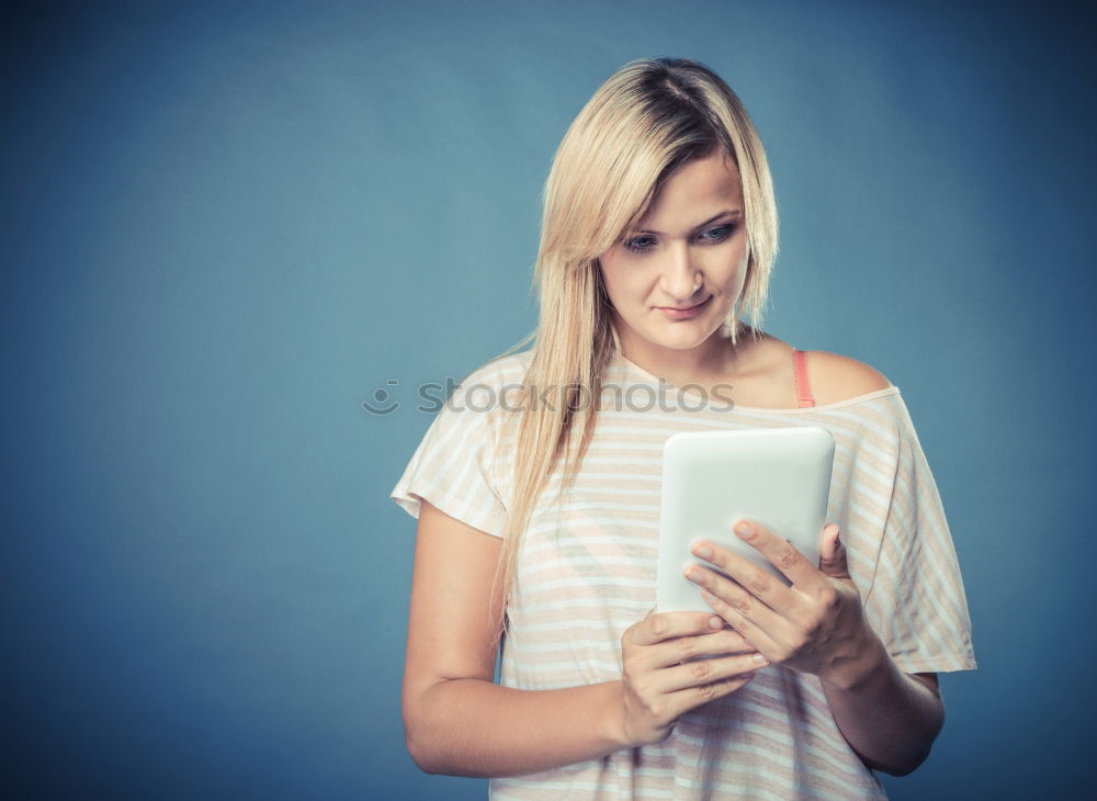 Similar – Image, Stock Photo Woman with grey dyed hair using her phone