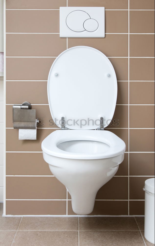 Similar – Image, Stock Photo Man pees freehand behind a screen in a urinal