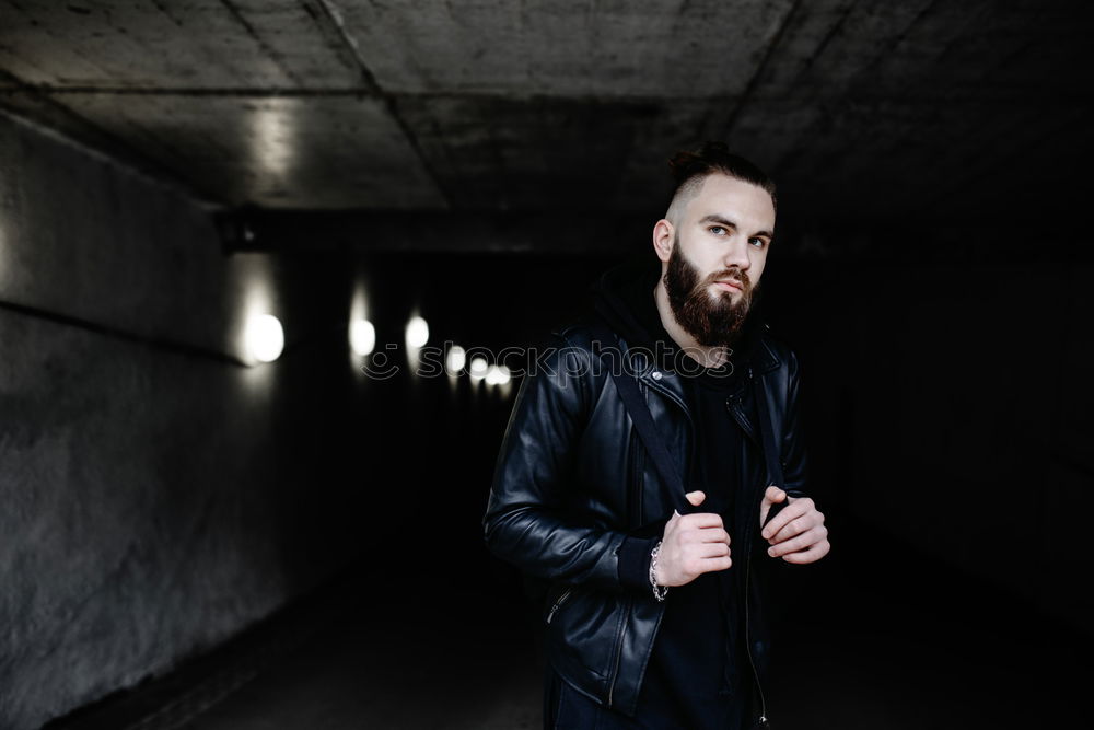 Similar – Image, Stock Photo Young handsome man over a dark brick wall