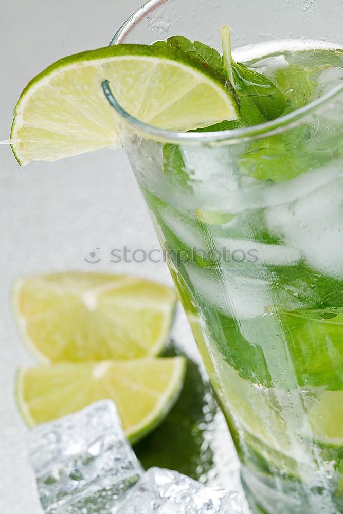 Similar – Mojito cocktail in glass on yellow background