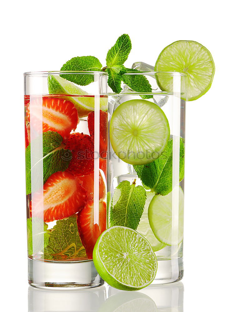 Similar – Image, Stock Photo A glass of soft drink with tangerine, cucumber and straw on white background