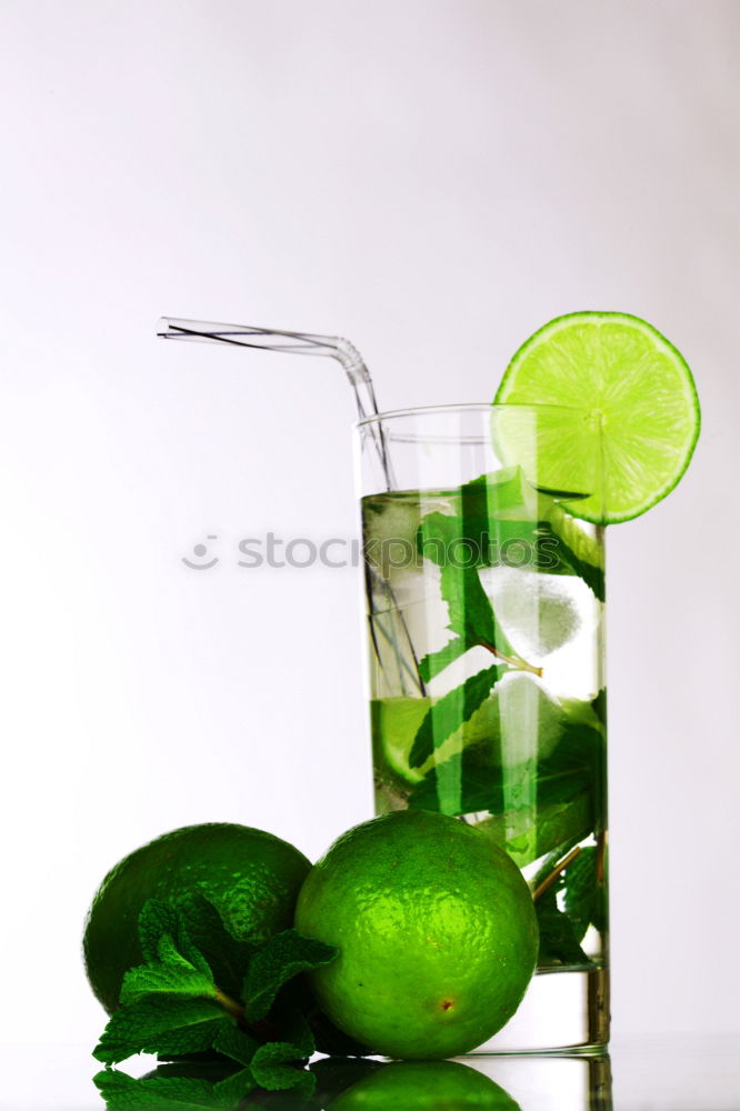 Similar – Image, Stock Photo Lime juice in bottle with fruits and juicer