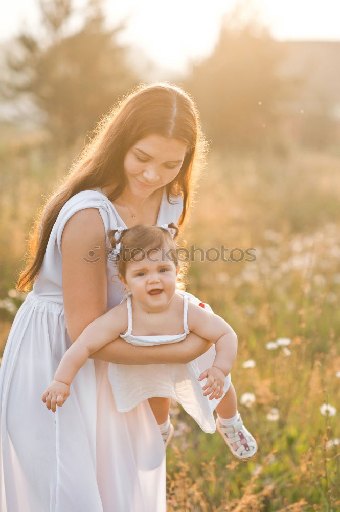 Similar – Image, Stock Photo Mother with child in park