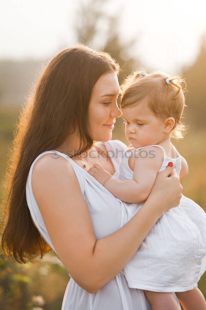 Similar – Image, Stock Photo Mother with child in park