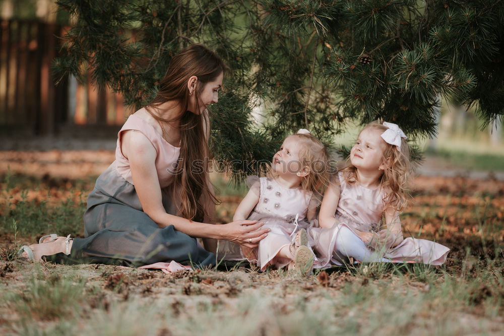 Similar – happy family: young mother walks with her child in the Park