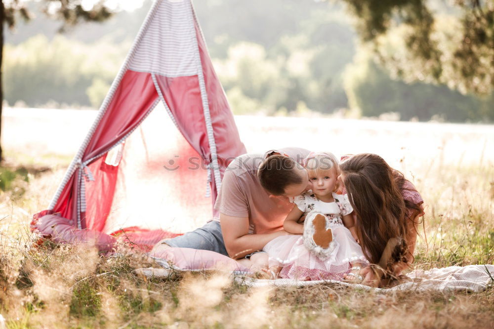 Similar – Woman with child on lawn