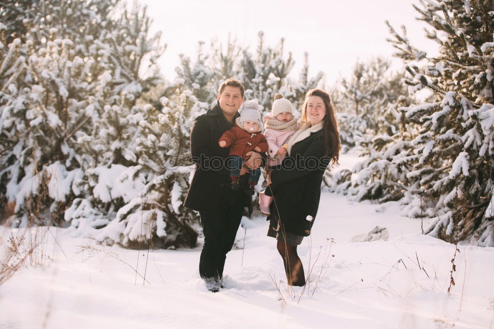 Similar – Couple having fun in winter forest