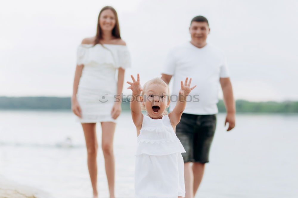 Similar – Image, Stock Photo Father and son playing on the beach