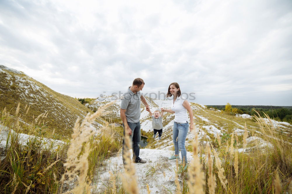 Similar – Couple of young people standing and held hands