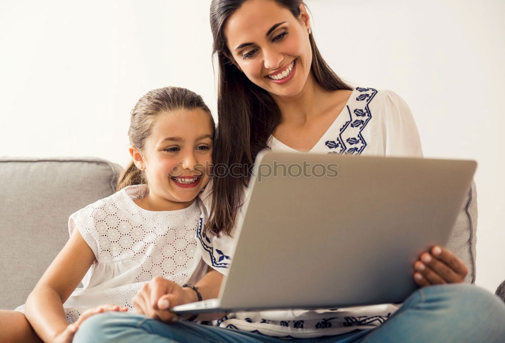 Similar – happy mother and toddler son using tablet