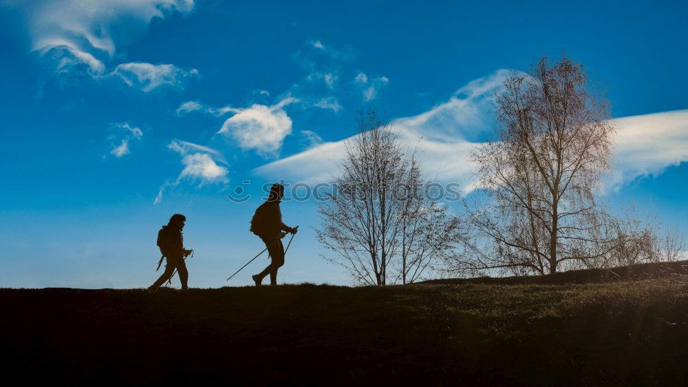 Similar – Image, Stock Photo Silhouette of hiking friends against sun