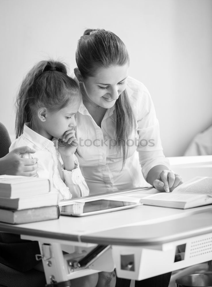 Similar – Image, Stock Photo Mother and her child with digital tablet.