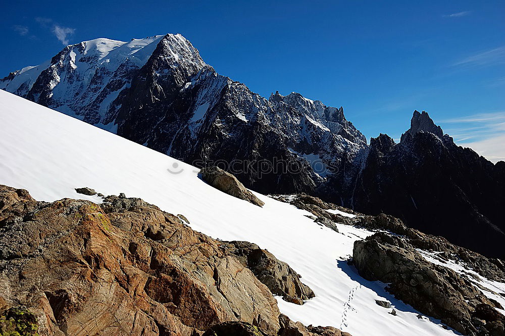 Similar – View from the Dachstein onto the mountain ridge to Dirndl (upright)