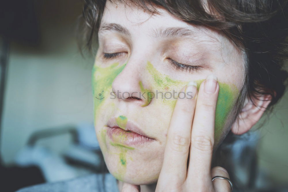 Similar – Young cute woman with paint in her face