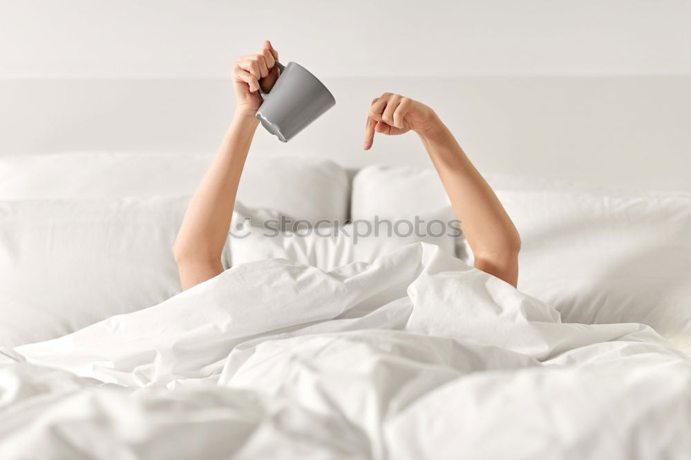 Similar – Image, Stock Photo Woman’s legs in bed on the white wall