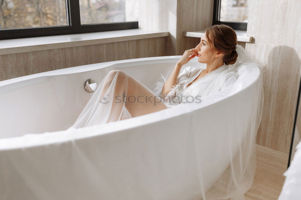 Similar – Image, Stock Photo Woman in a modern bath tub