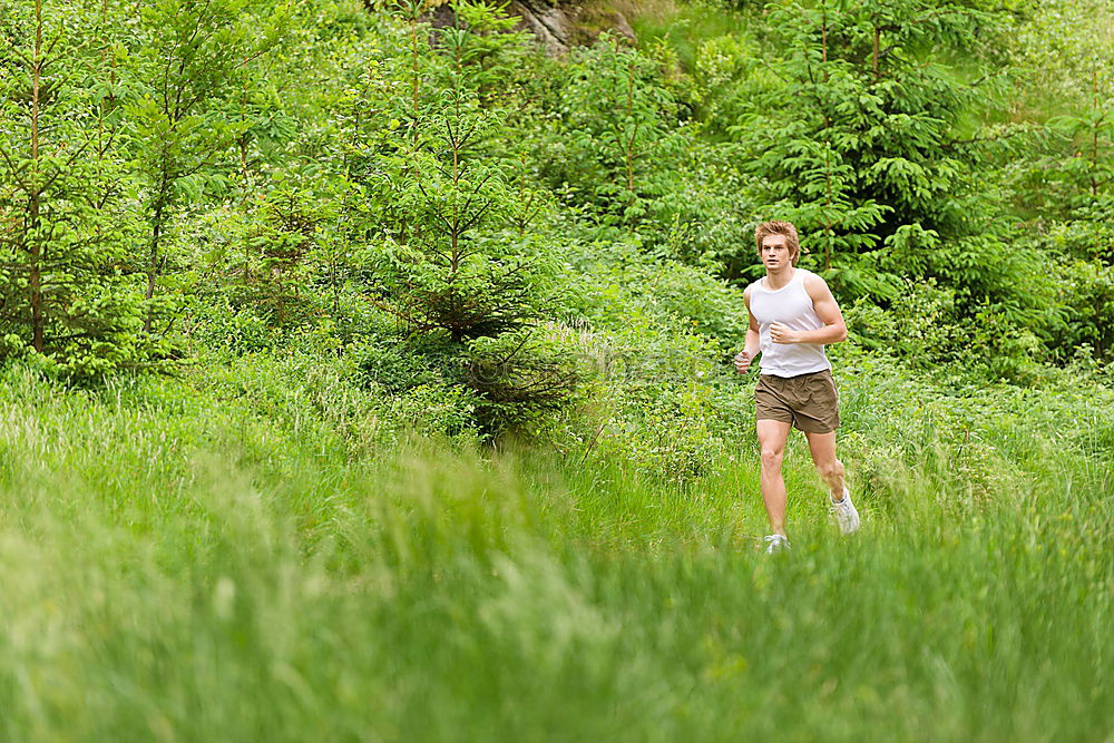 Similar – Senior Man Running in the Forest