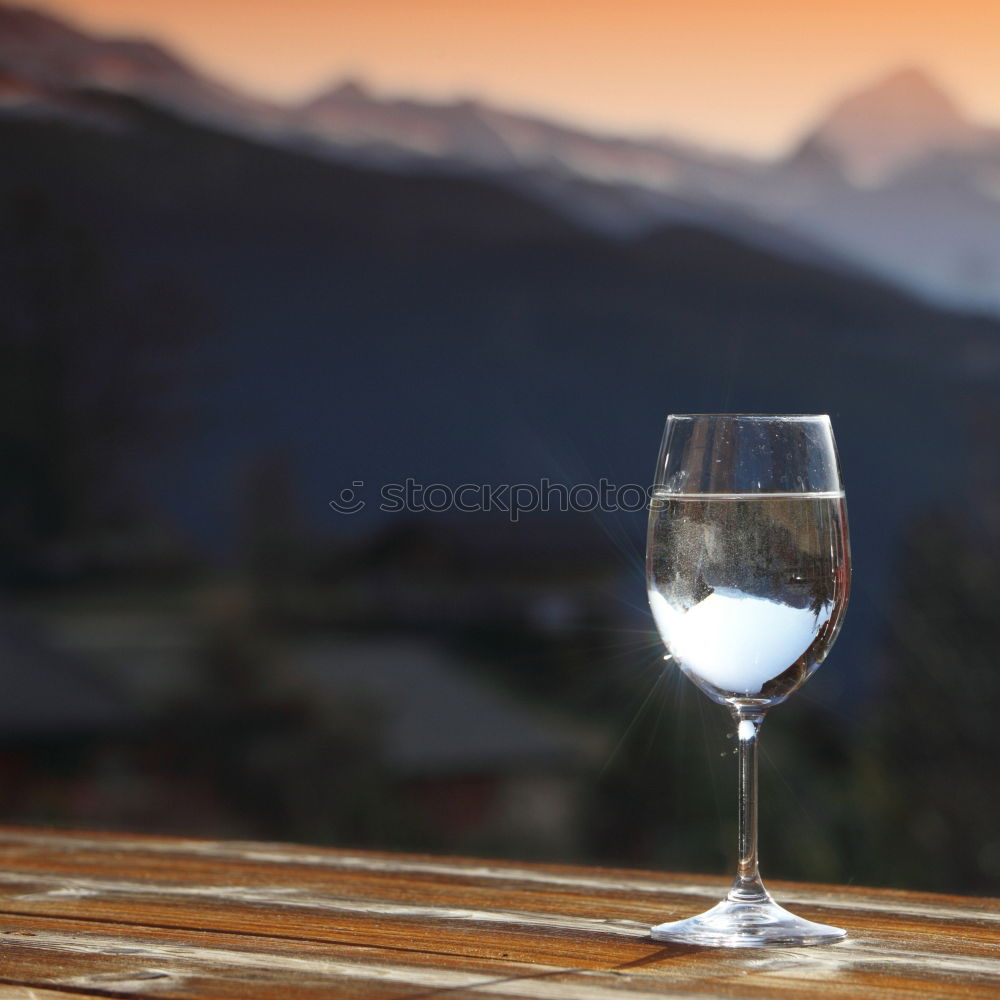 Similar – Bottle of red wine and table set on the veranda