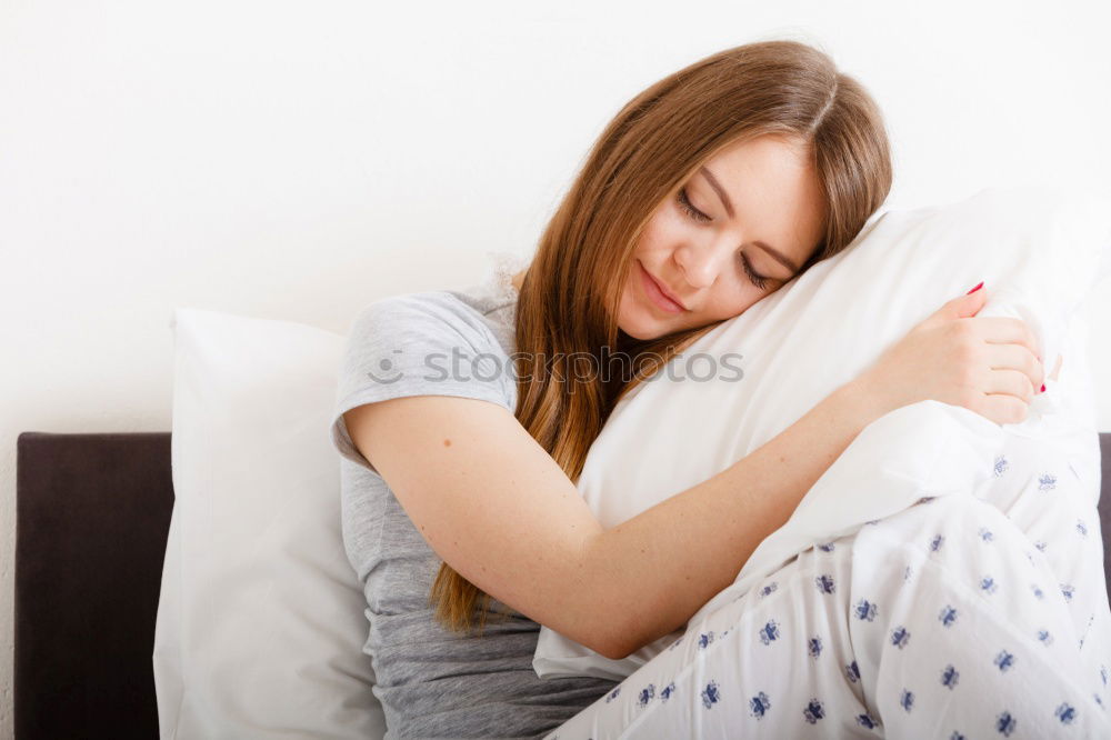 Similar – Woman sleeping in bed