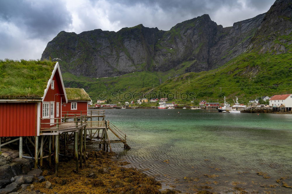 Similar – Image, Stock Photo Boat with red sail on a calm sea and fisherman house