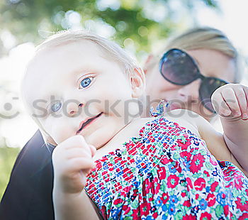 Similar – Image, Stock Photo Cute child on hands of mother