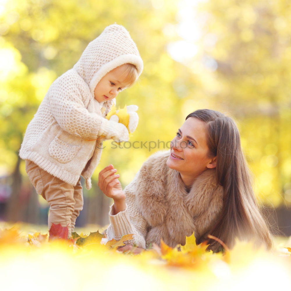 Similar – Girls tying baked Christmas gingerbread cookies with ribbon