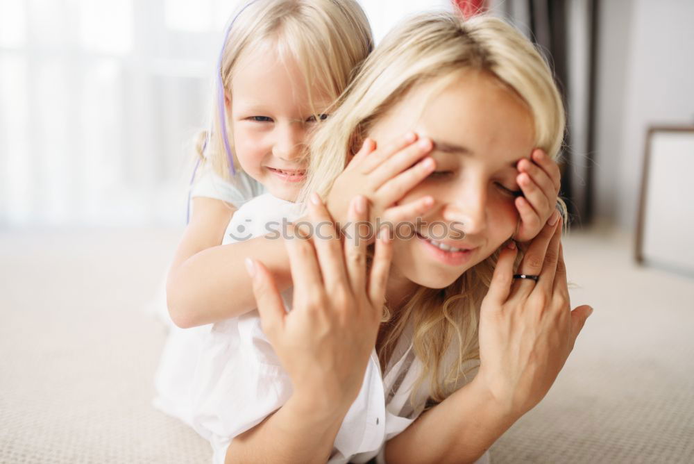 Similar – Portrait of two happy children sitting on the stairs