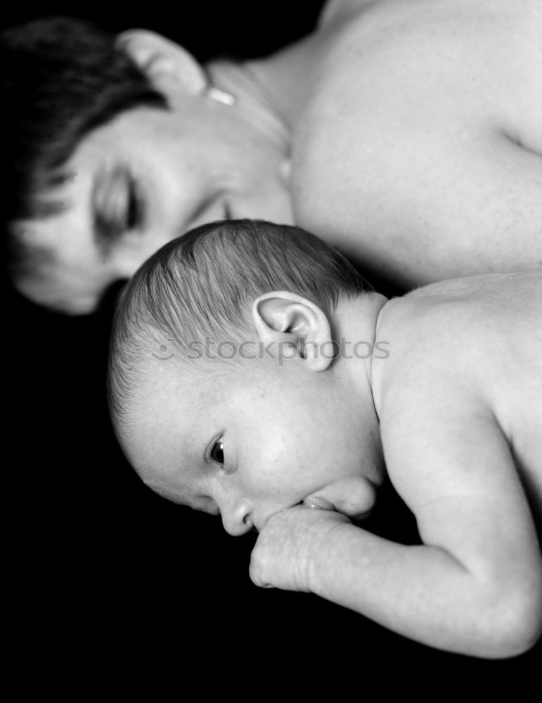 Similar – Mother breastfeed newborn