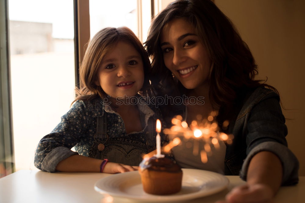 Similar – child girl playing checkers with her dad