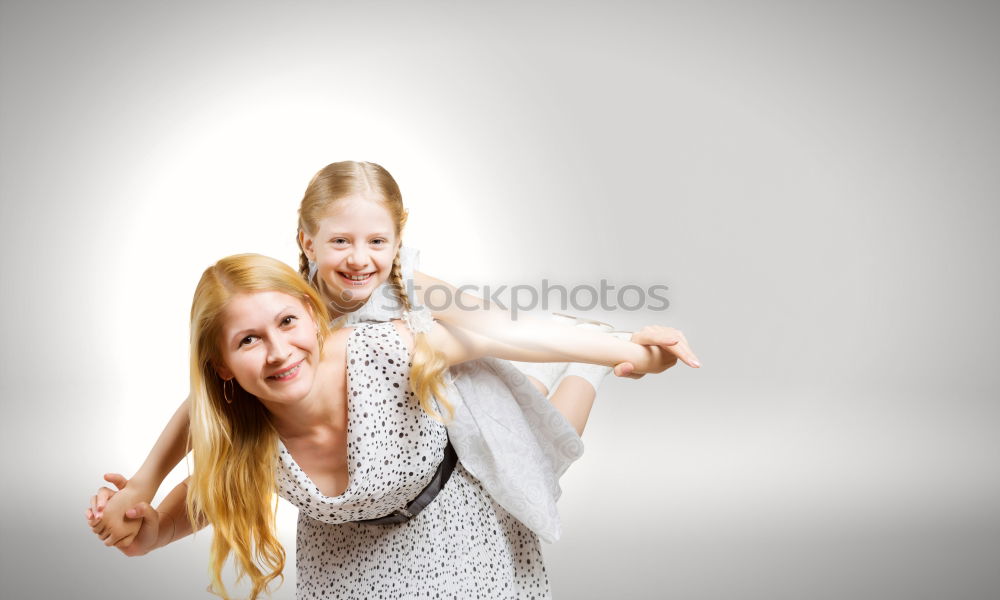 Similar – Image, Stock Photo Two beautiful sister kids playing under white sheets