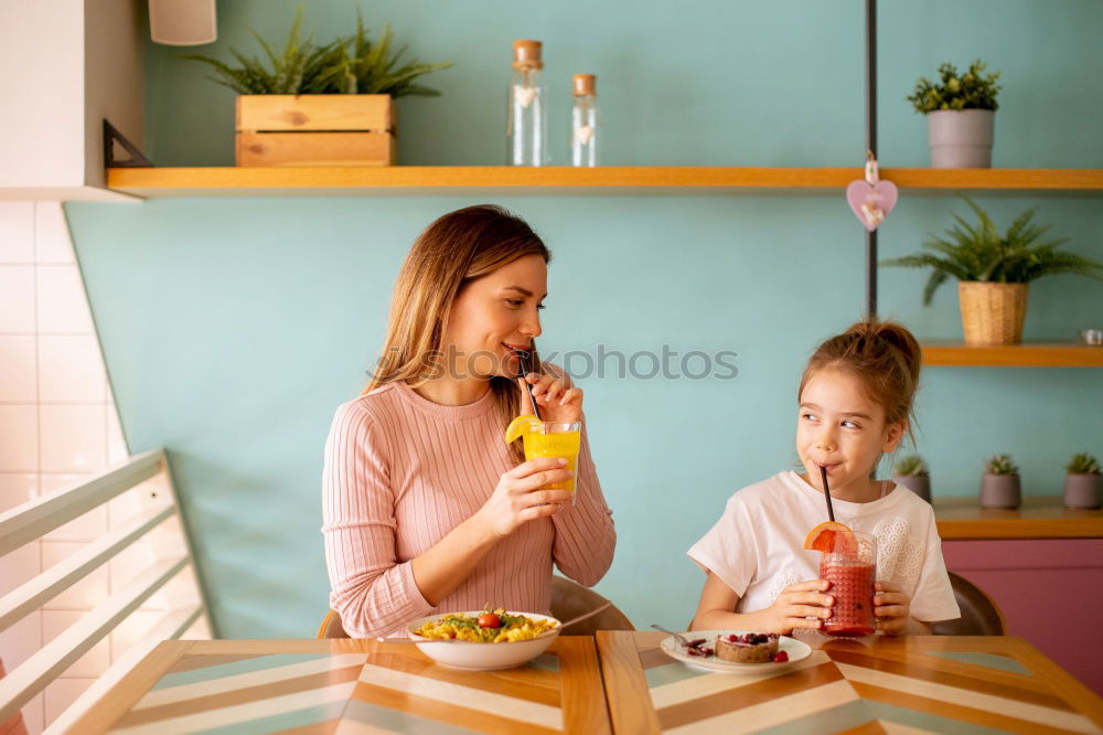 Similar – Image, Stock Photo toddler girl with pregnant mother at home