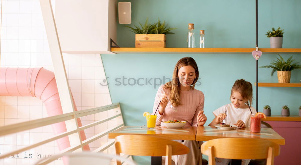 Similar – Two beautiful sister kids eating watermelon ice cream