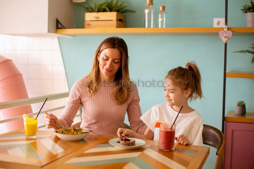 Similar – Image, Stock Photo toddler girl with pregnant mother at home