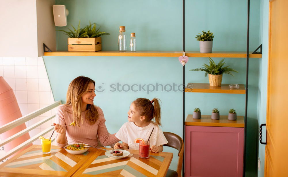 Similar – Two beautiful sister kids eating watermelon ice cream