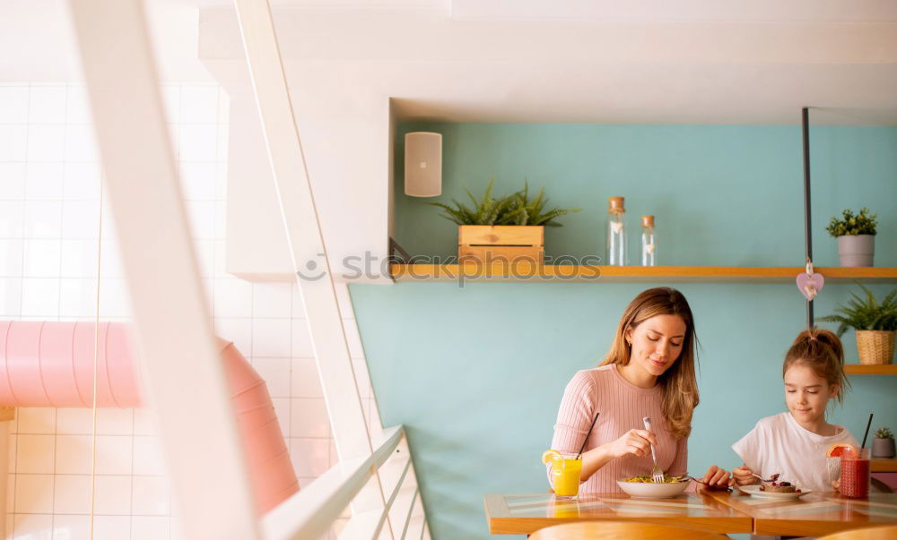 Similar – Two beautiful sister kids eating watermelon ice cream