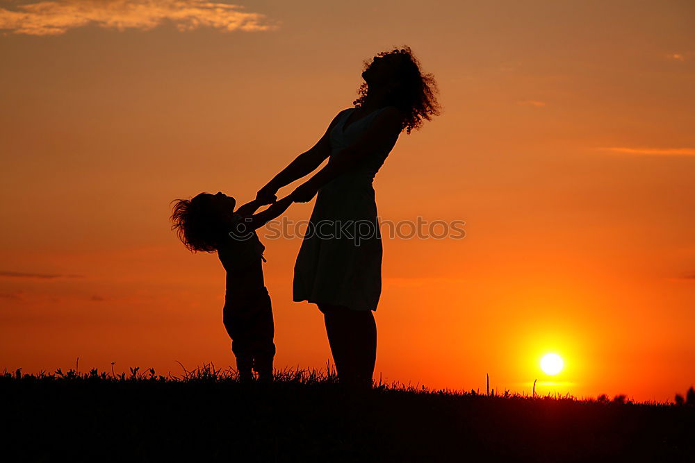 Similar – Father and son playing on the beach at the day time. Concept of friendly family.