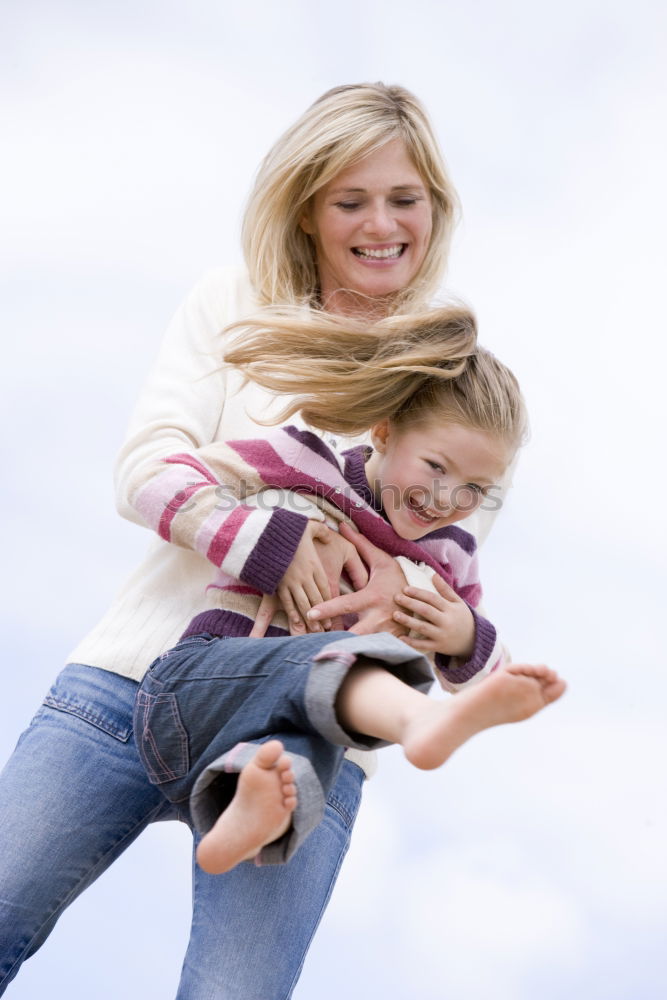 Similar – Two kids riding together wtih a skate board