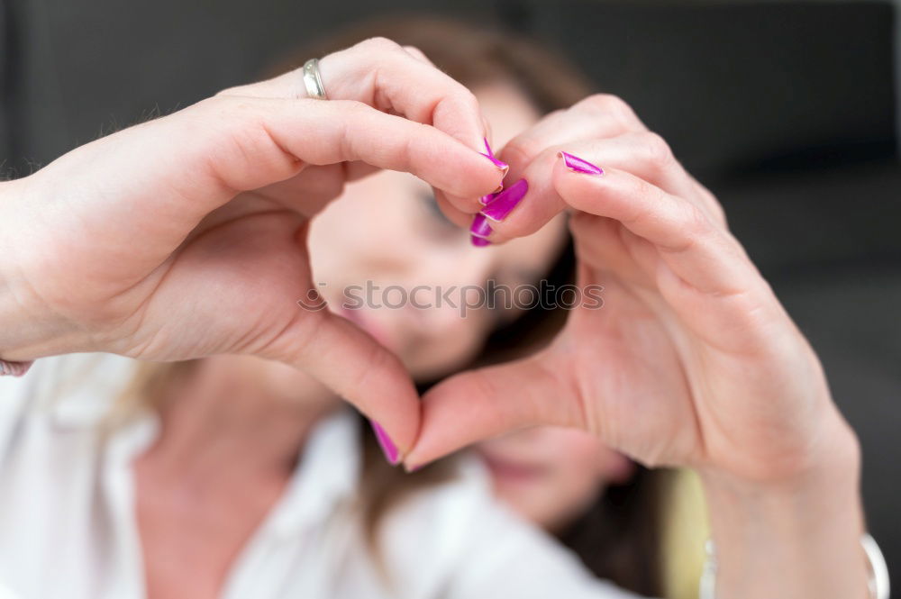 Similar – Closeup of woman’s hands using a smartphone