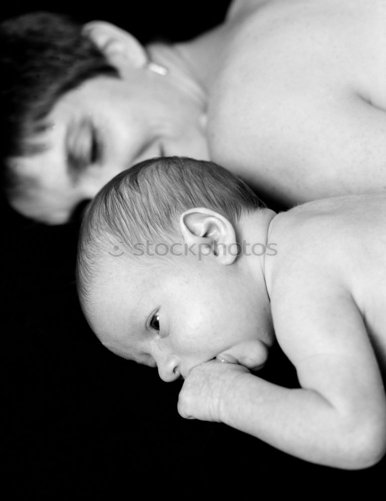 Similar – Mother breastfeed newborn