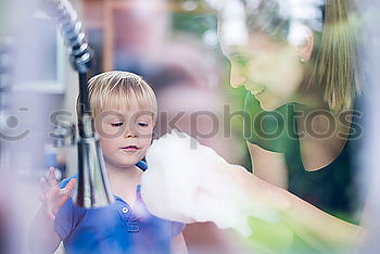 Similar – Image, Stock Photo Girl in dress bites into grilled corn in front of a cabin in nature