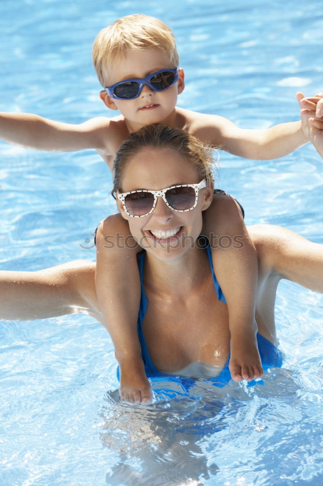 Similar – two little girls playing in the pool at the day time