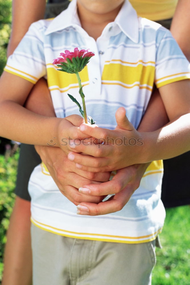 Similar – Woman hold bouquet of origami flowers