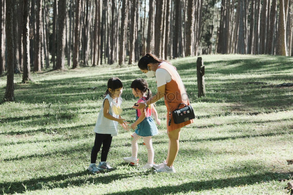 Similar – Image, Stock Photo Family spending vacation time together on a picnic