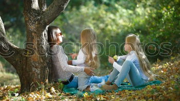 Similar – Image, Stock Photo Family spending vacation time together on a picnic